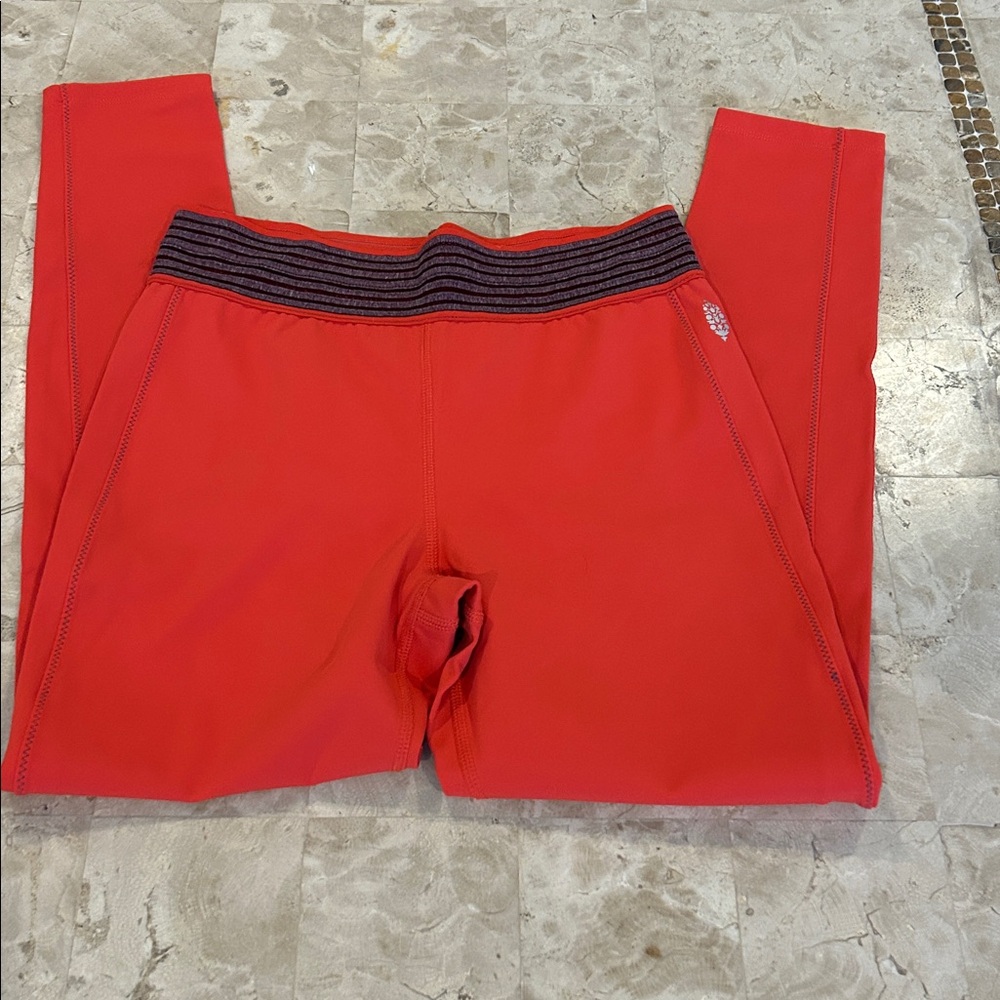 Free People Movement orange leggings /purple stripes‎ on the waistband Size S
